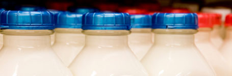 Milk bottles on a shelf